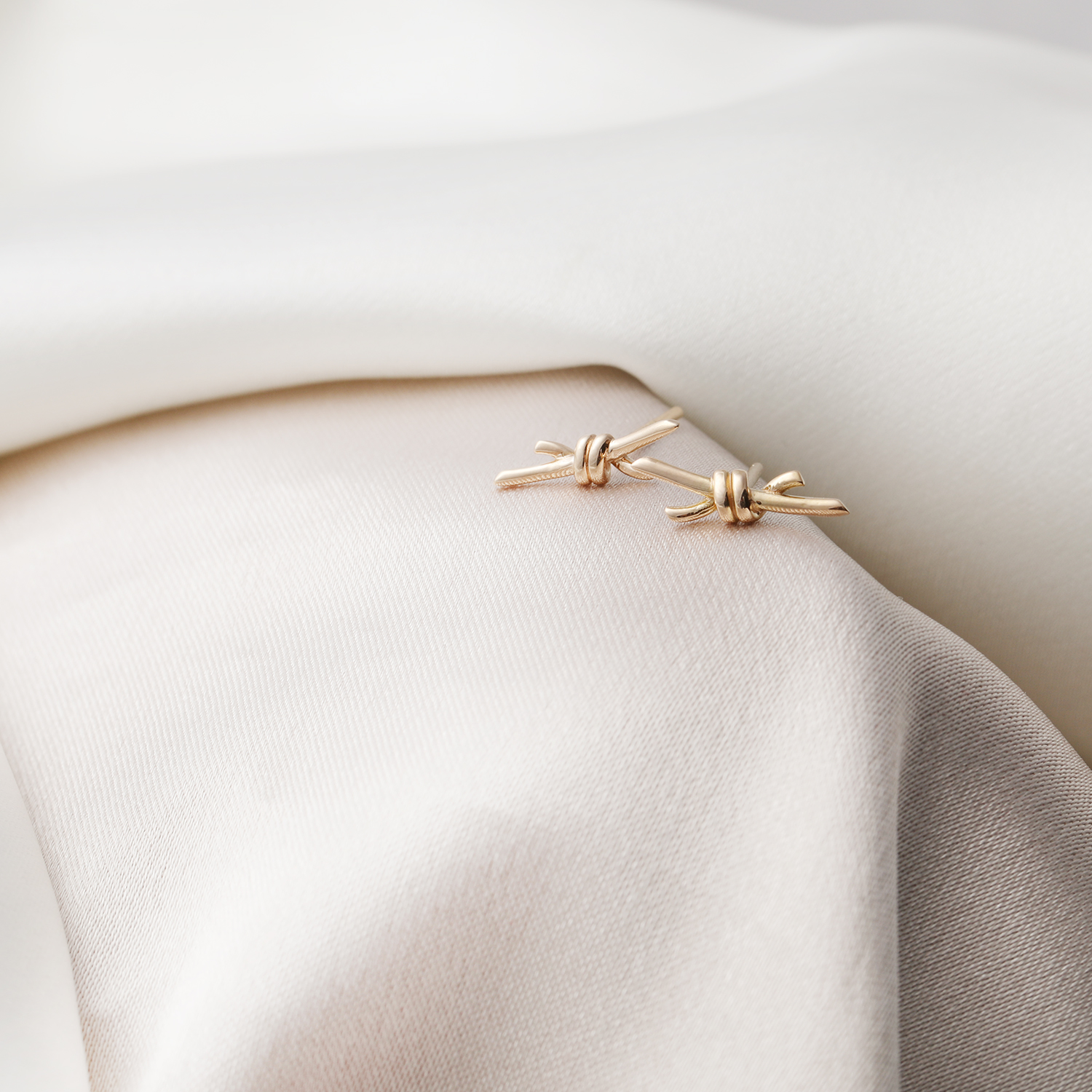 گوشواره-گره-تیفانی-ظریف گوشواره گره تیفانی ظریف