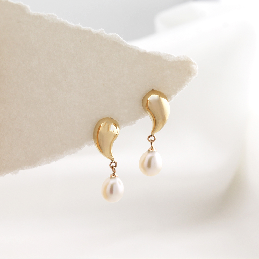 e اشک دامله و مروارید پرورشی