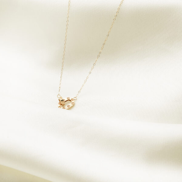 گردنبند دو حلقه کارتیه بیضی تخت