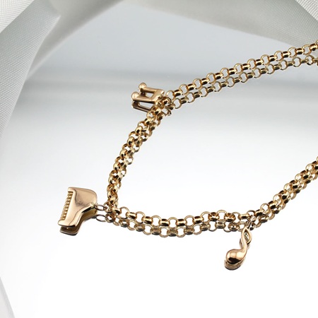 طلا با نماد موسیقی 2