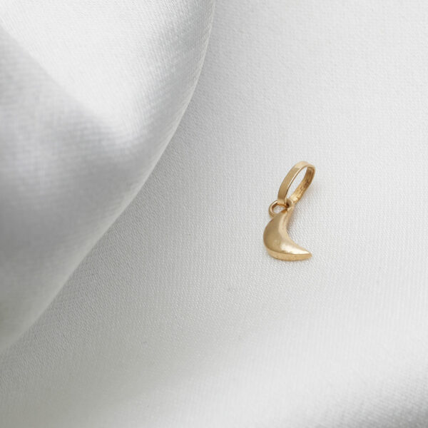 Delicate crescent moon pendant and oval ring